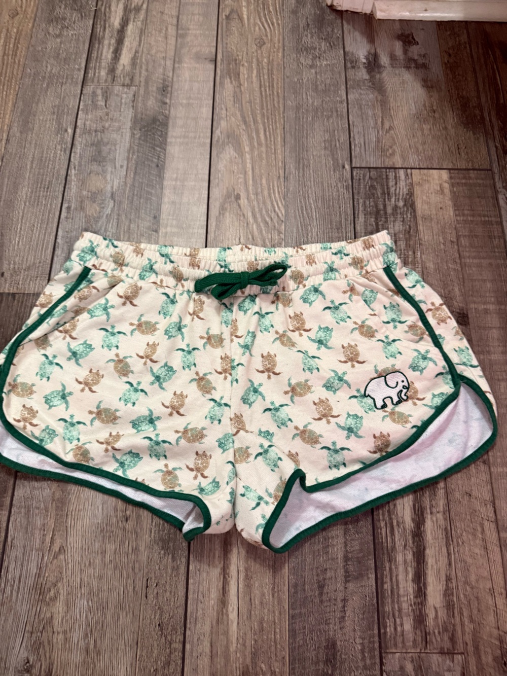ivory ella Cream Shorts with Green & Tan Turtle Print